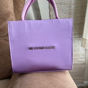 Cute purse lovely lilac type color Brandon Blackwood